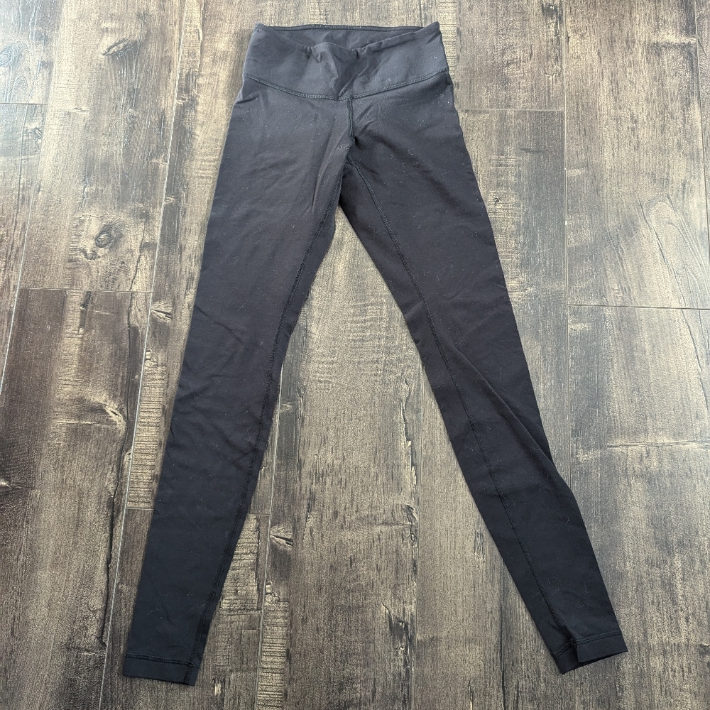 Lululemon athletica black luon legging size 4.